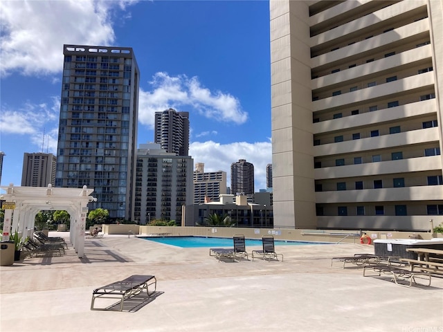 444 Niu St Unit 815, Honolulu, HI 96815 - community pool with a city view and a patio