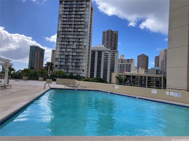 444 Niu St Unit 815, Honolulu, HI 96815 - community pool featuring a city view and a patio area