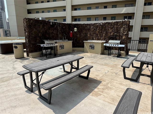 444 Niu St Unit 815, Honolulu, HI 96815 - view of patio / terrace featuring outdoor dining area and area for grilling