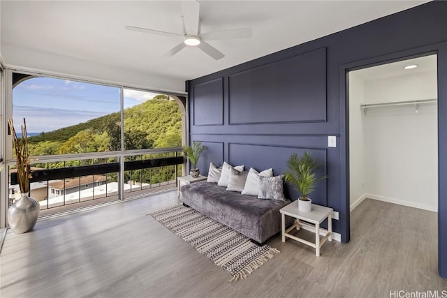 interior space featuring ceiling fan