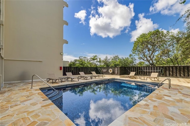 view of pool featuring a patio