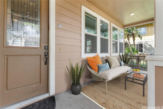 doorway to property with a porch