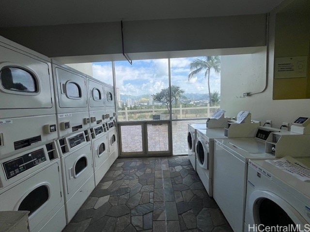 laundry area featuring washer and dryer and stacked washer / dryer