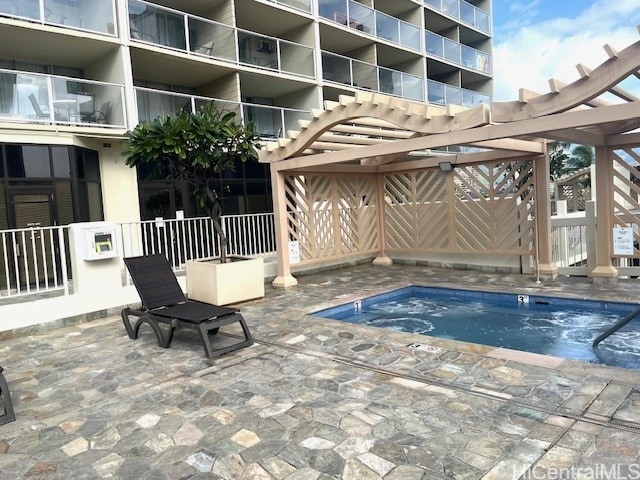 view of pool featuring a pergola and a community hot tub