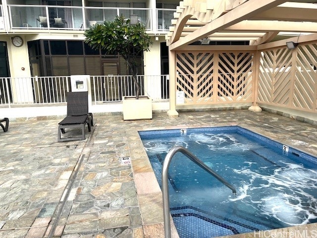 view of swimming pool featuring a patio