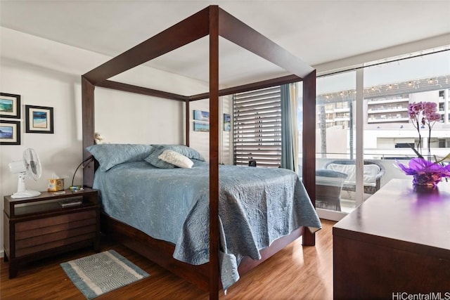 bedroom featuring wood-type flooring