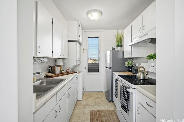 kitchen featuring sink, white electric range, and white cabinets