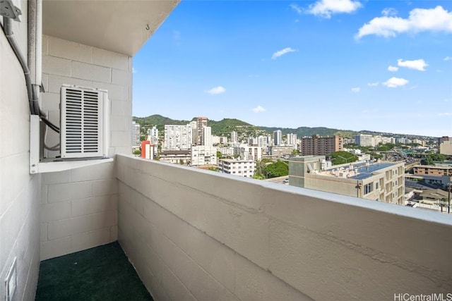 balcony featuring ac unit