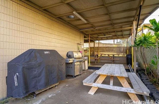 view of patio with a grill