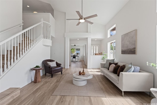 92-6012 Kohi St, Kapolei, HI 96707 - living room featuring a ceiling fan, wood finished floors, and high vaulted ceiling