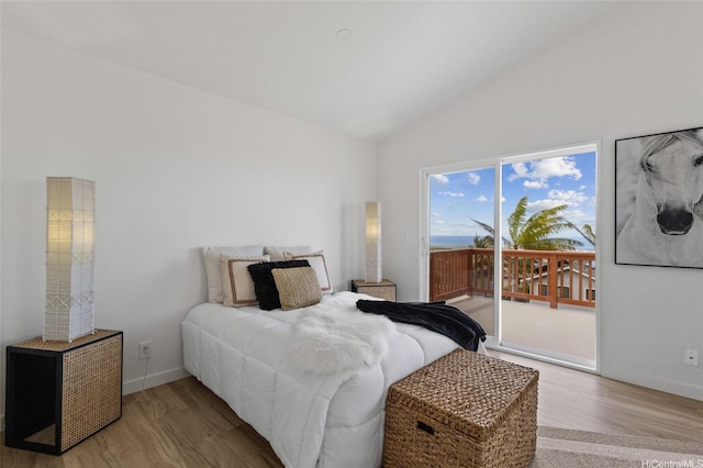 92-6012 Kohi St, Kapolei, HI 96707 - bedroom with access to outside, wood finished floors, and high vaulted ceiling