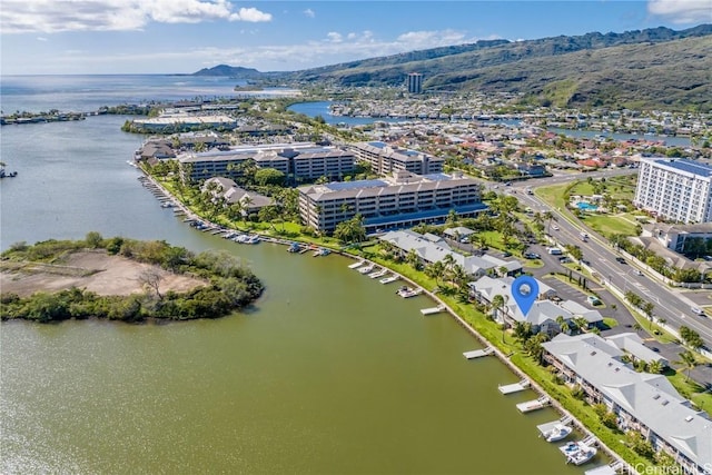 drone / aerial view featuring a water and mountain view