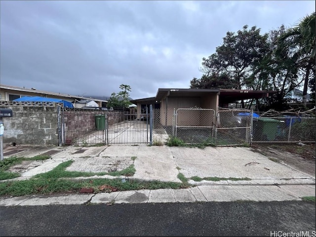 view of front of home with a carport