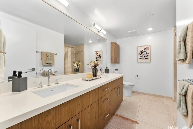 bathroom with vanity, tile patterned flooring, a shower with curtain, and toilet