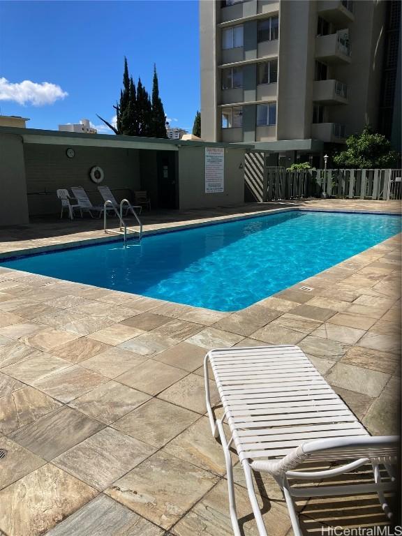 view of pool featuring a patio