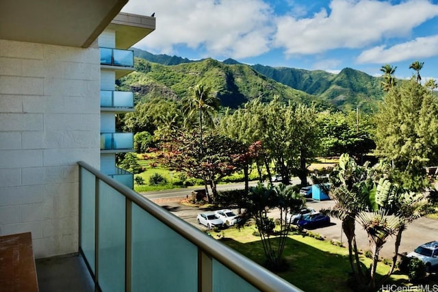 balcony featuring a mountain view