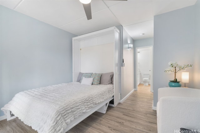 bedroom with light wood-type flooring