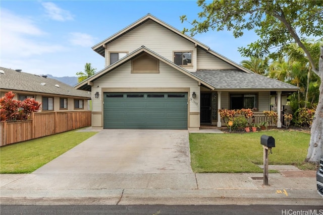 view of front facade featuring a garage and a front lawn