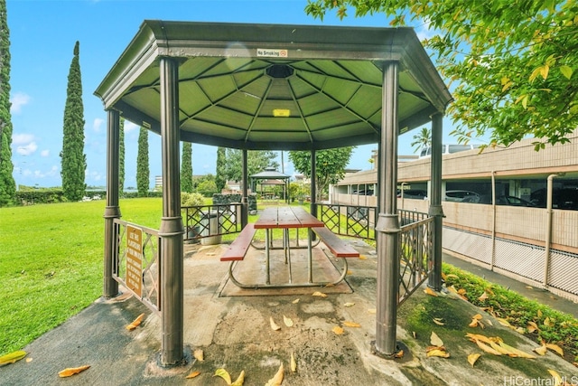 view of play area featuring a gazebo and a lawn