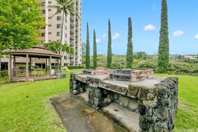 view of community with a yard and a gazebo