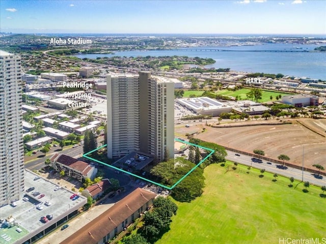 birds eye view of property with a water view