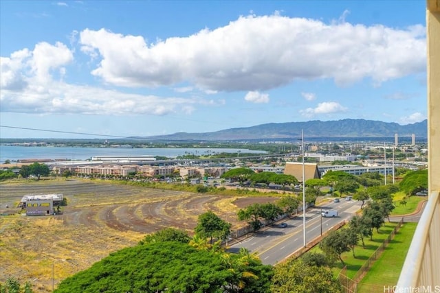 bird's eye view with a water and mountain view