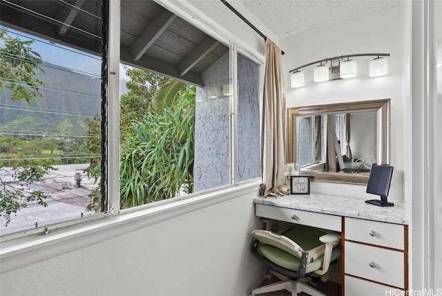 office space featuring a textured ceiling