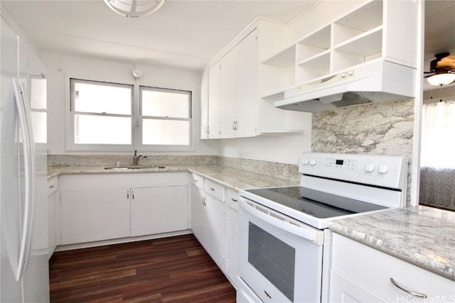 kitchen with white cabinetry, sink, white appliances, and dark hardwood / wood-style floors