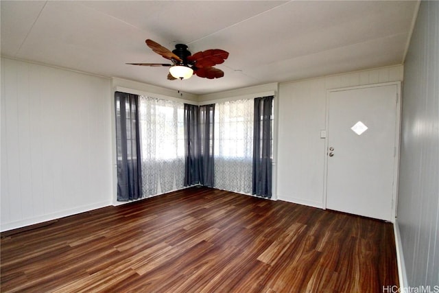 entrance foyer featuring dark wood-type flooring and ceiling fan