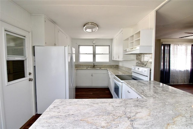 kitchen featuring sink, white appliances, dark wood-type flooring, white cabinetry, and light stone countertops