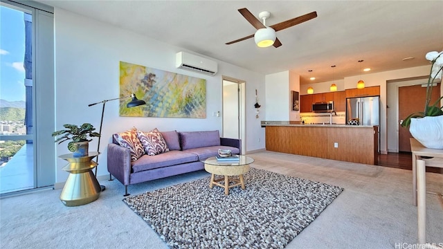 carpeted living room with ceiling fan, sink, and a wall unit AC