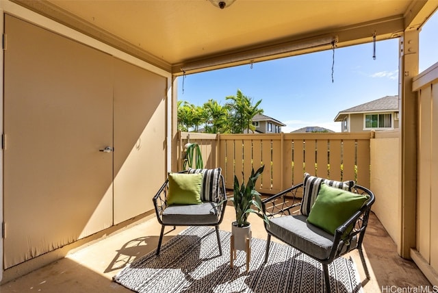 view of patio with a balcony