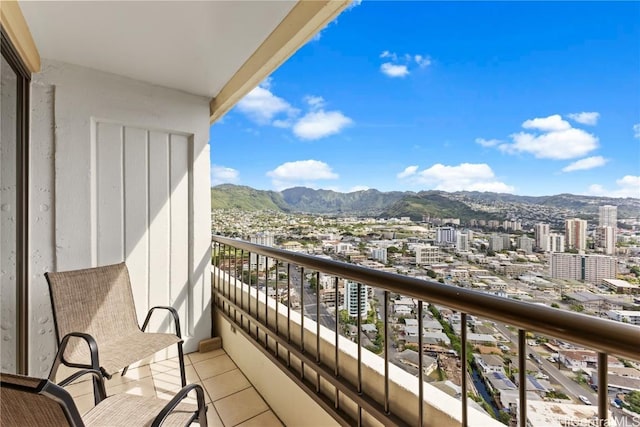 balcony featuring a mountain view