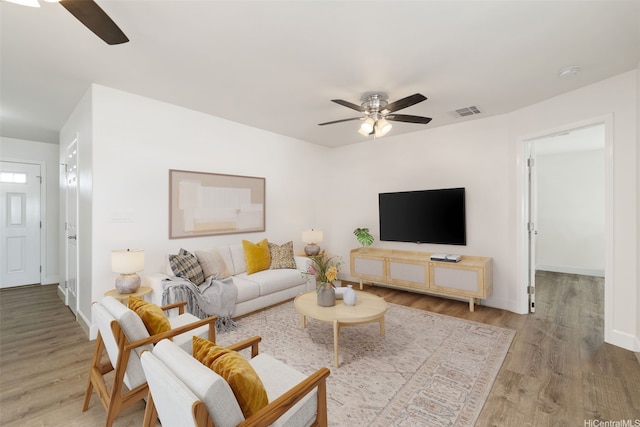 85-075 Waianae Valley Rd Unit B, Waianae, HI 96792 - living room featuring a ceiling fan, wood finished floors, and baseboards