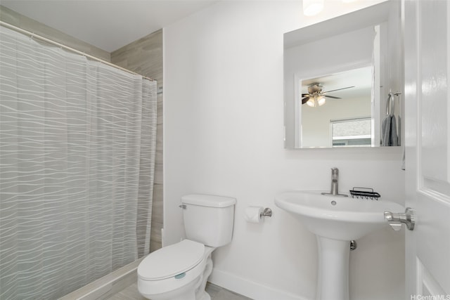 85-075 Waianae Valley Rd Unit B, Waianae, HI 96792 - bathroom with toilet, a shower with shower curtain, baseboards, and a ceiling fan