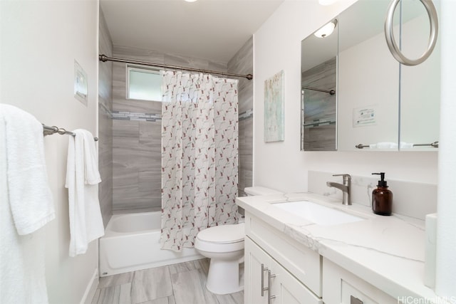 full bathroom with vanity, toilet, and shower / tub combo