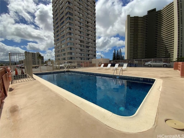 view of pool featuring a patio area