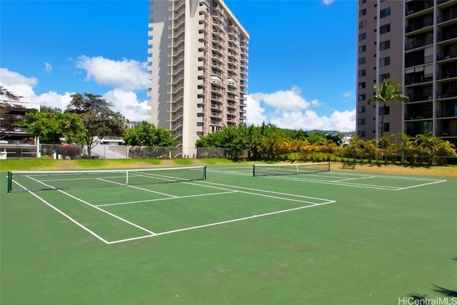 view of sport court with community basketball court and fence