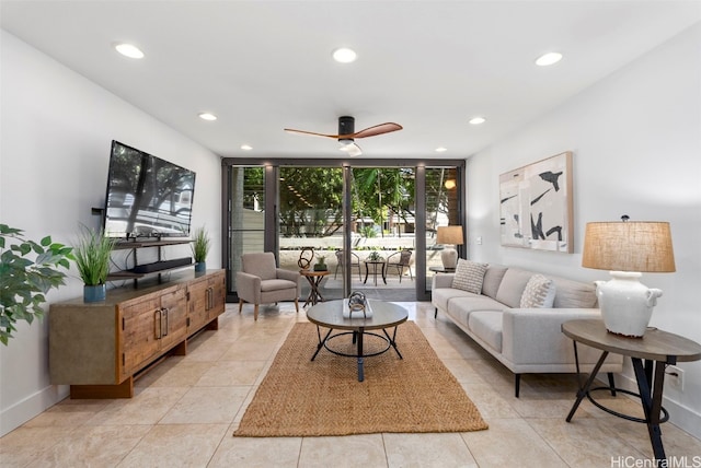 living area featuring recessed lighting, expansive windows, ceiling fan, and light tile patterned floors