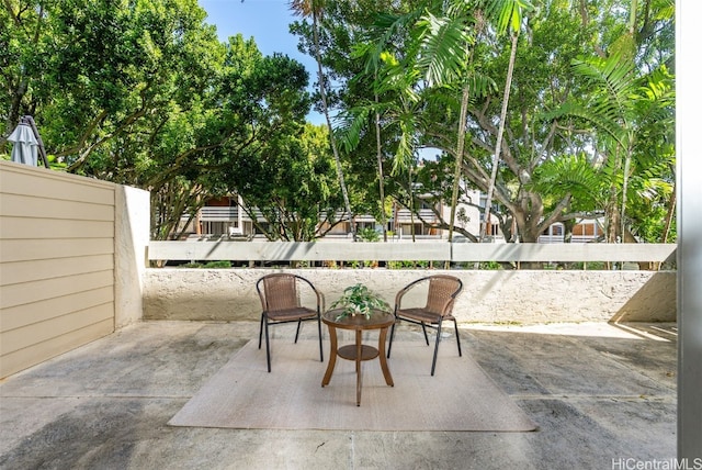 view of patio with fence