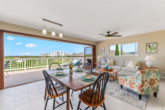 3515 Upper St, Honolulu, HI 96815 - dining area featuring a city view, a ceiling fan, and light tile patterned floors