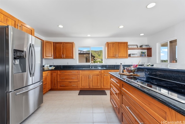 3515 Upper St, Honolulu, HI 96815 - kitchen featuring black electric cooktop, stainless steel fridge, a sink, open shelves, and brown cabinetry