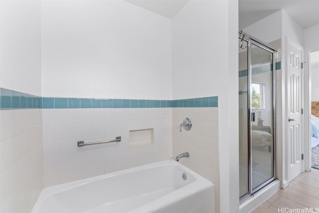 3515 Upper St, Honolulu, HI 96815 - bathroom featuring tile patterned floors, a garden tub, and a shower stall