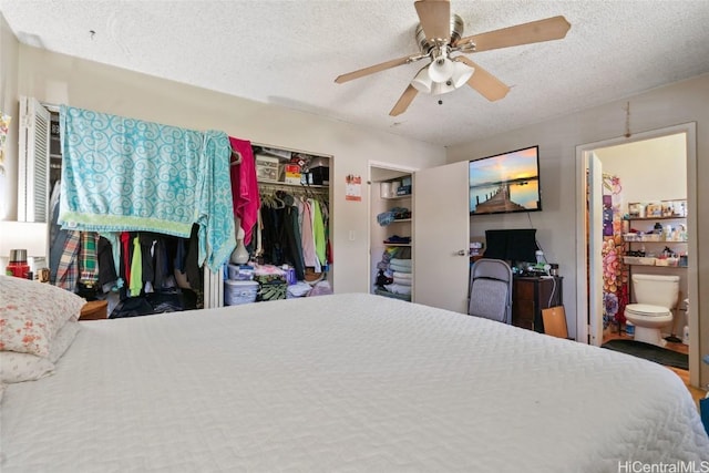 bedroom with ceiling fan, a closet, connected bathroom, and a textured ceiling