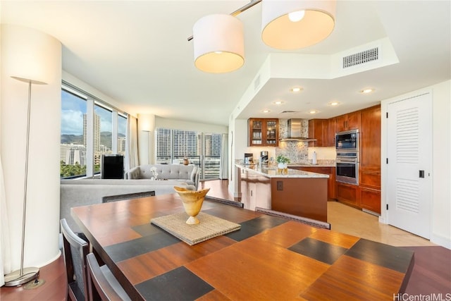 dining space featuring recessed lighting and visible vents