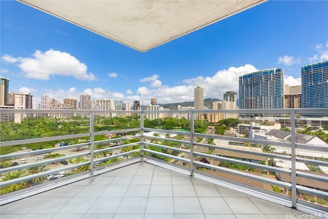 balcony featuring a city view