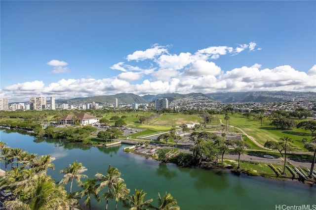 birds eye view of property featuring a water and mountain view