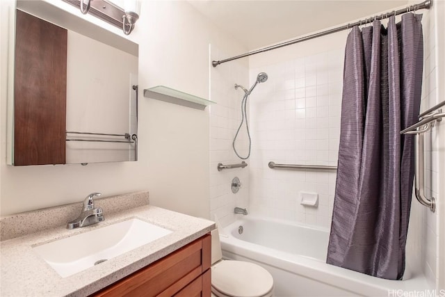 full bathroom with vanity, toilet, and shower / tub combo