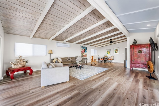 living room with lofted ceiling with beams, wooden ceiling, a wall unit AC, and light hardwood / wood-style flooring