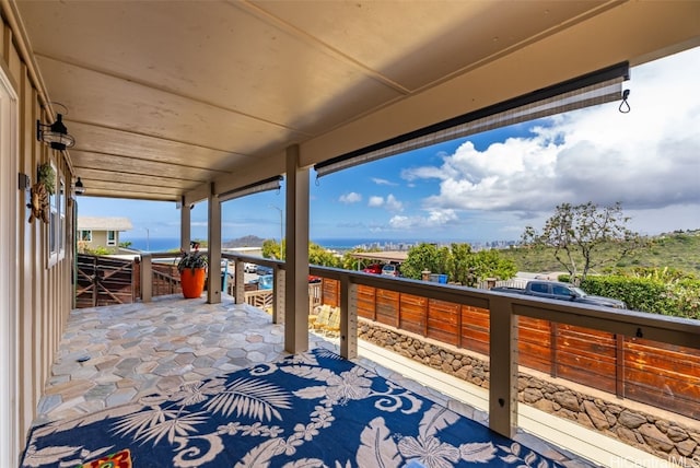 view of patio / terrace with a water view